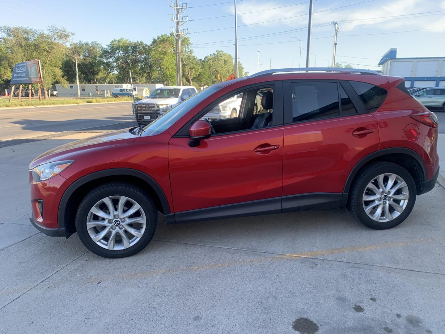 2014 Mazda CX-5 Grand Touring (JM3KE2DY8E0) with an 2.5L L4 DOHC 16V engine, 6A transmission, located at 2015 Cambell Street, Rapid City, SD, 57701, (605) 342-8326, 44.066433, -103.191772 - ARRIVING SOON- Photo#2