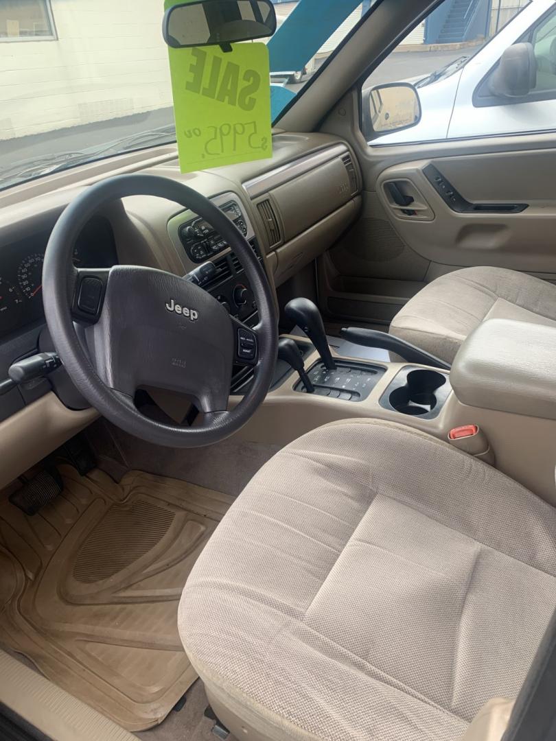 2001 Jeep Grand Cherokee Laredo 4WD (1J4GW48S31C) with an 4.0L L6 OHV 12V engine, located at 2015 Cambell Street, Rapid City, SD, 57701, (605) 342-8326, 44.066433, -103.191772 - CAR FAX AVAILABLE FRESH TRADE CASH ONLY- Photo#3