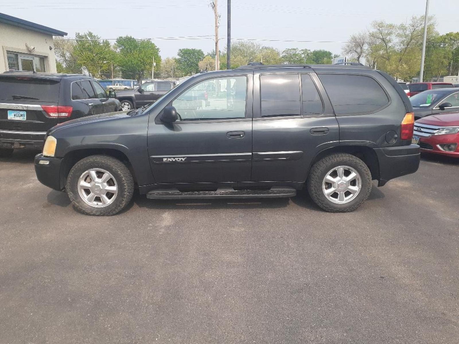 2004 GMC Envoy (1GKDT13S642) with an L6, 4.2L; DOHC engine, located at 2015 Cambell Street, Rapid City, SD, 57701, (605) 342-8326, 44.066433, -103.191772 - Photo #0