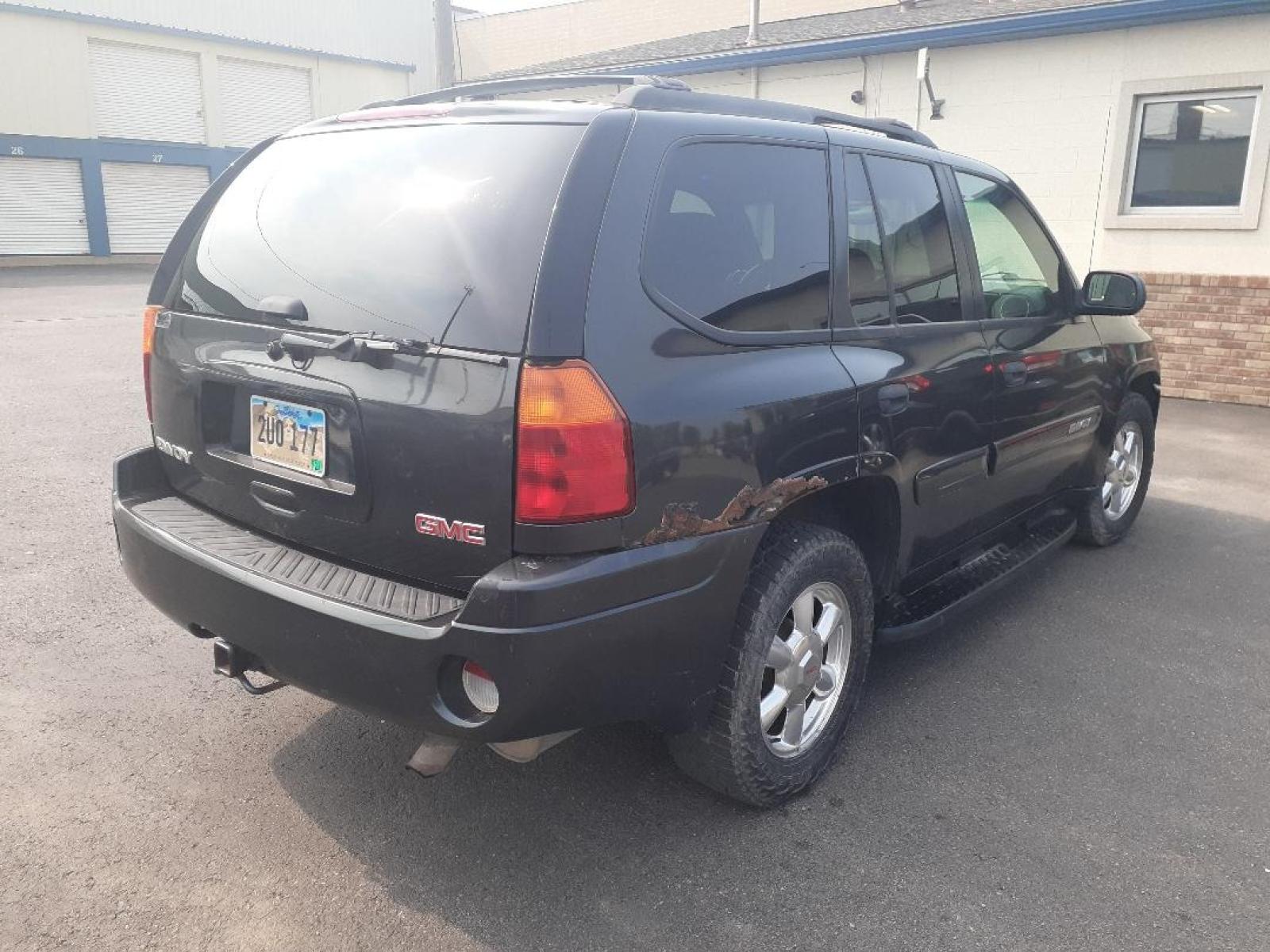 2004 GMC Envoy (1GKDT13S642) with an L6, 4.2L; DOHC engine, located at 2015 Cambell Street, Rapid City, SD, 57701, (605) 342-8326, 44.066433, -103.191772 - CARFAX AVAILABLE - Photo #4