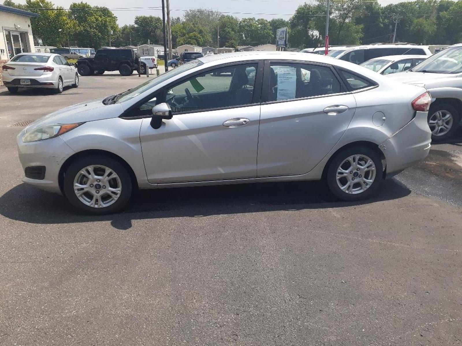 2016 Ford Fiesta (3FADP4BJ4GM) with an 1.6L L4 DOHC 16V engine, located at 2015 Cambell Street, Rapid City, SD, 57701, (605) 342-8326, 44.066433, -103.191772 - CARFAX AVAILABLE - Photo #0
