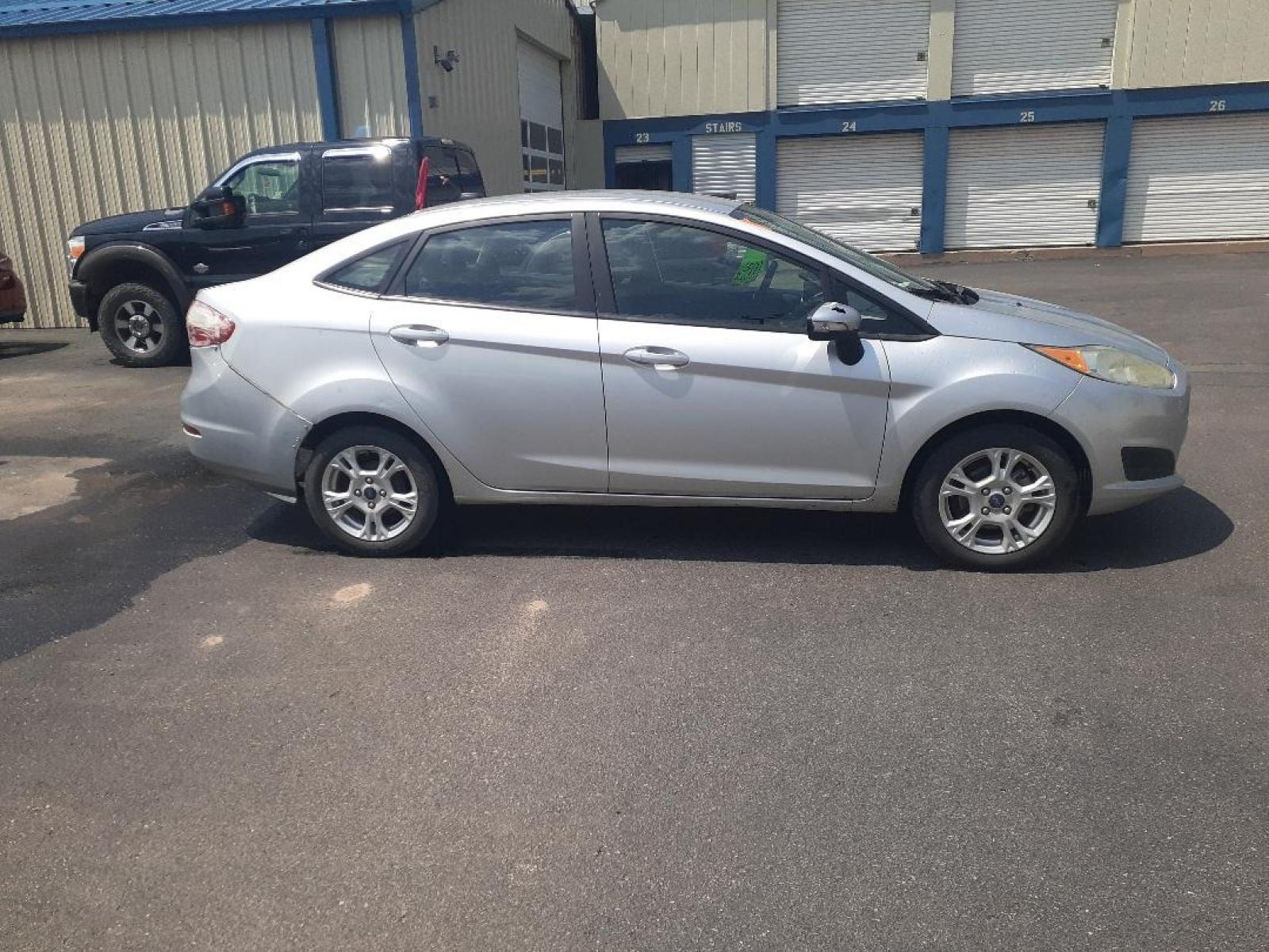 2016 Ford Fiesta (3FADP4BJ4GM) with an 1.6L L4 DOHC 16V engine, located at 2015 Cambell Street, Rapid City, SD, 57701, (605) 342-8326, 44.066433, -103.191772 - CARFAX AVAILABLE - Photo #7